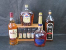 Whisky including; open Bushmills Black Rush, sealed Bells, sealed Crown Royal,