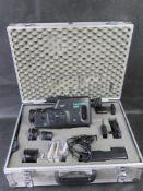 A Canon Canovision E60 camcorder with accessories in flight case.