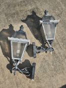 A pair of garden wall lights, approx 64cm tall.