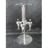 A rotating drinks optic for four bottles.