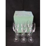 A set of six crystal sherry glasses.