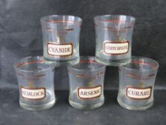 A set of five 'Pick Your Poison' beakers.