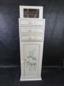 A contemporary floor standing jewellery cabinet.