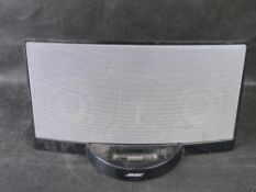 A Bose sound dock. Disclaimer: electrical items are sold as untested and without guarantee.