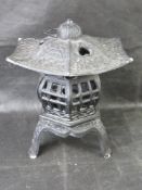 A cast iron Japanese pagoda lantern.
