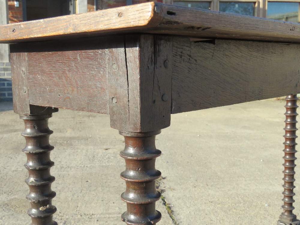 An antique oak console or hall table having barley twist legs and stretchers. - Image 6 of 6