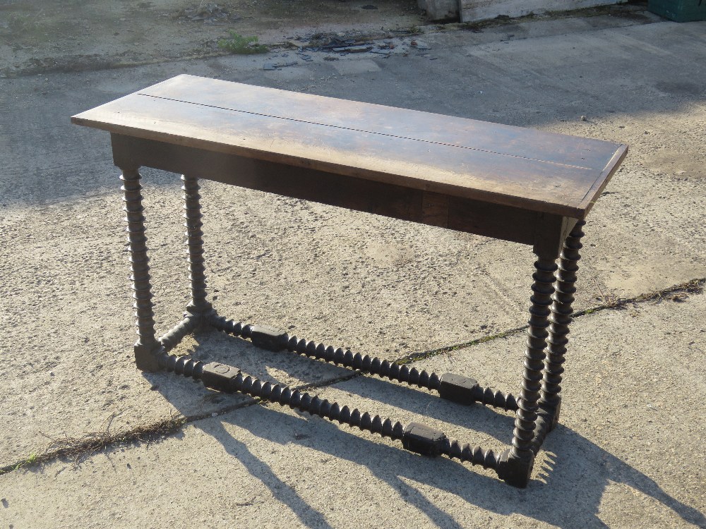 An antique oak console or hall table having barley twist legs and stretchers. - Image 4 of 6