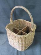 A four section wicker wine basket.