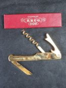 A Krug Champagne bottle opener in original box.
