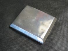 A HM silver cigarette case having engine turned pattern to front and back, gilded interior,