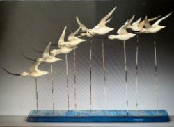 Fine Art; Guy Taplin (b. Whitechapel, London, UK 1939), Nine flying Godwit c.2015, hand carved wood sculpture.