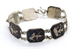 A Siam white metal panel bracelet, no apparent hallmarks.