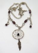 A silver Native American style dream catcher pendant on chain, stamped 925.