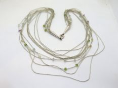 A Native American style silver bead necklace, multi strand with coloured beads,