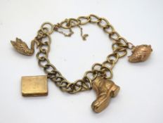 A 9ct gold charm bracelet hallmarked throughout, having four charms upon; boot,