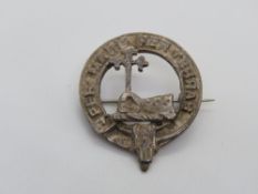 A silver Clan MacDonald brooch - Per Mare Per Terras (By sea and land), Edinburgh hallmark.