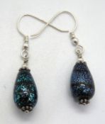 A pair of foiled glass drop earrings with 925 silver hangers.