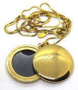 A silver locket on box link chain, stamped 925, locket approx 30mm dia.