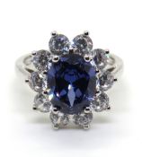 A classic silver cluster ring, cz floral cluster size K.