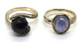 Two silver rings, size J/K.