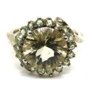 A silver cocktail ring, size K.