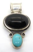 A large silver, onyx and turquoise pendant, stamped 925 Mexico, 50mm in length.