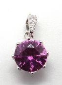 A silver and hot pink cz pendant, stamped 925, 15mm inc bale.