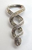 A 9ct white gold pendant set with diamonds, stamped 375, 27mm in length, 1.3g.