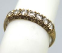 A 9ct gold eternity ring set with cz stones, hallmarked 375, size K, 1.
