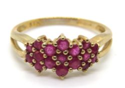 A 9ct gold ruby cluster ring, hallmarked 375, size K, 1.