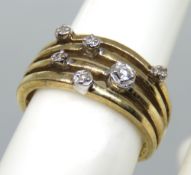 A 9ct gold ring with stardust illusion set diamond pattern, hallmarked 375, size L, 3.