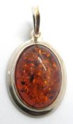 A silver and amber pendant, stamped 925, 33mm inc bale.