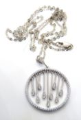 A silver and white stone pendant, stamped 925, 35mm in length, on silver chain.