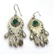 A pair of silver and green stone large d
