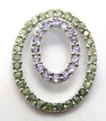 A silver tanzanite and peridot pendant, stamped 925,