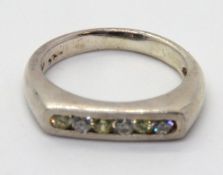 A 925 silver half eternity ring having a