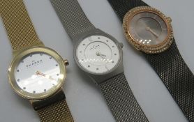 Three Skagen wristwatches on integral straps.