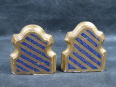 A pair of antique gilt wood bookends in the form of books.