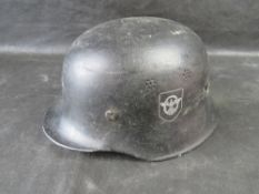 An M34 pattern German helmet.