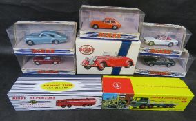A quantity of Dinky scale model classic cars and commercial vehicles.