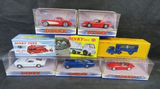 A quantity of Dinky scale model classic cars and commercial vehicles.