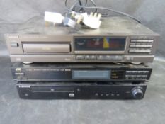 A Technics CD player together with Samsung DVD player and JVC tuner. Three items.