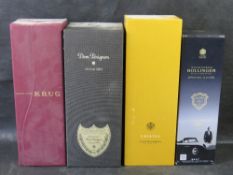 Four empty decorative champagne boxes; Krug, Dom Perignon, Cristal and Bollinger.