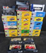 A quantity of Vanguards scale model classic cars and commercial vehicles.