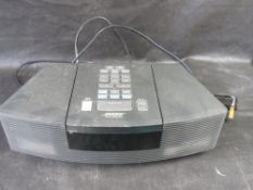 A Bose Wave radio/cd. Disclaimer: electrical items are sold as untested and without guarantee.