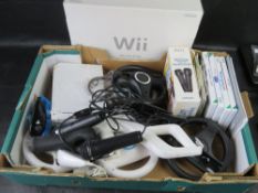 A Nintendo Wii console, controllers, games, etc.