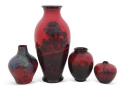 Group of Royal Doulton flambe wares including a large vase with woodland scene, signed by Noke,