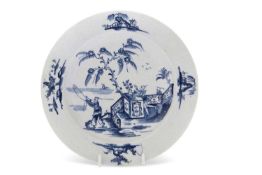A rare Lowestoft porcelain plate circa 1765, the centre with a chinoiserie type fishing scene, the