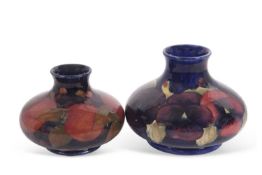 Two Moorcroft vases mid 20th Century both of compressed ovoid form, one in the Pomegranate