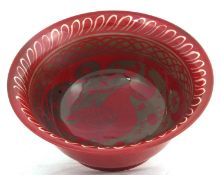 A large flambe bowl by Bernard Moore, the interior with geometric design